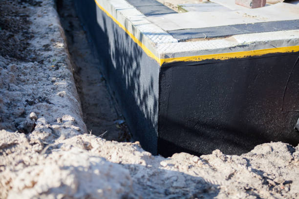 Professional Waterproofing technician working in Sharon Center, OH